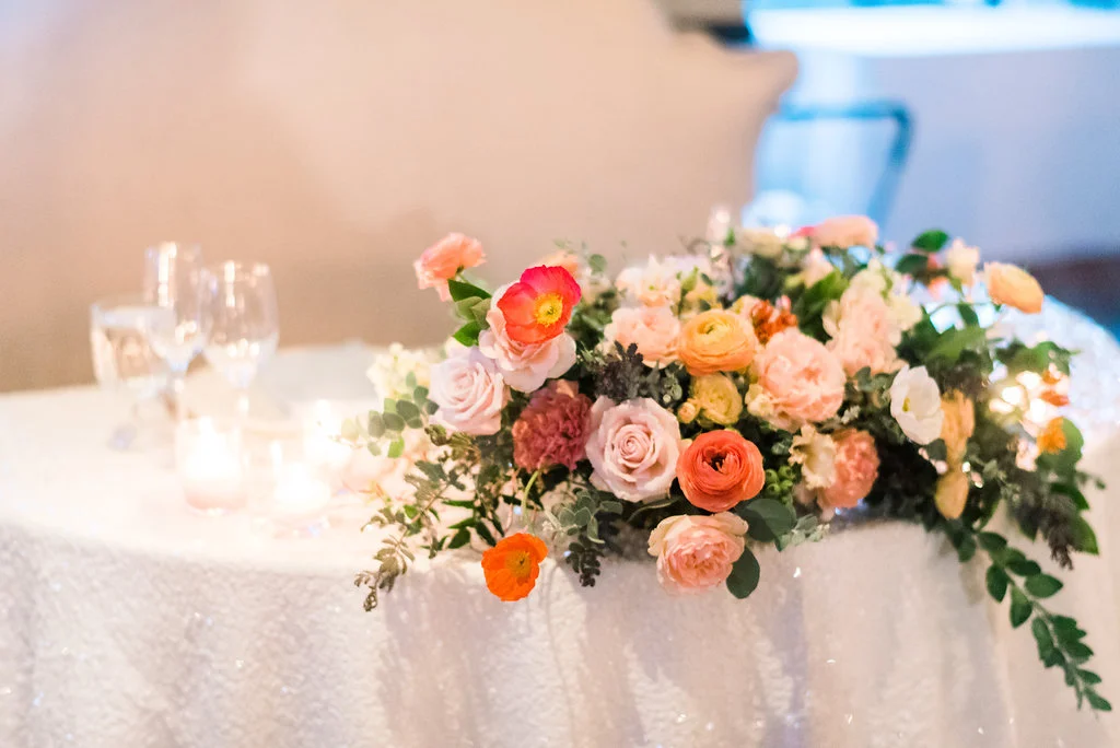 Sweetheart-table-flower-centerpiece-hauteblossomsfloral.jpg