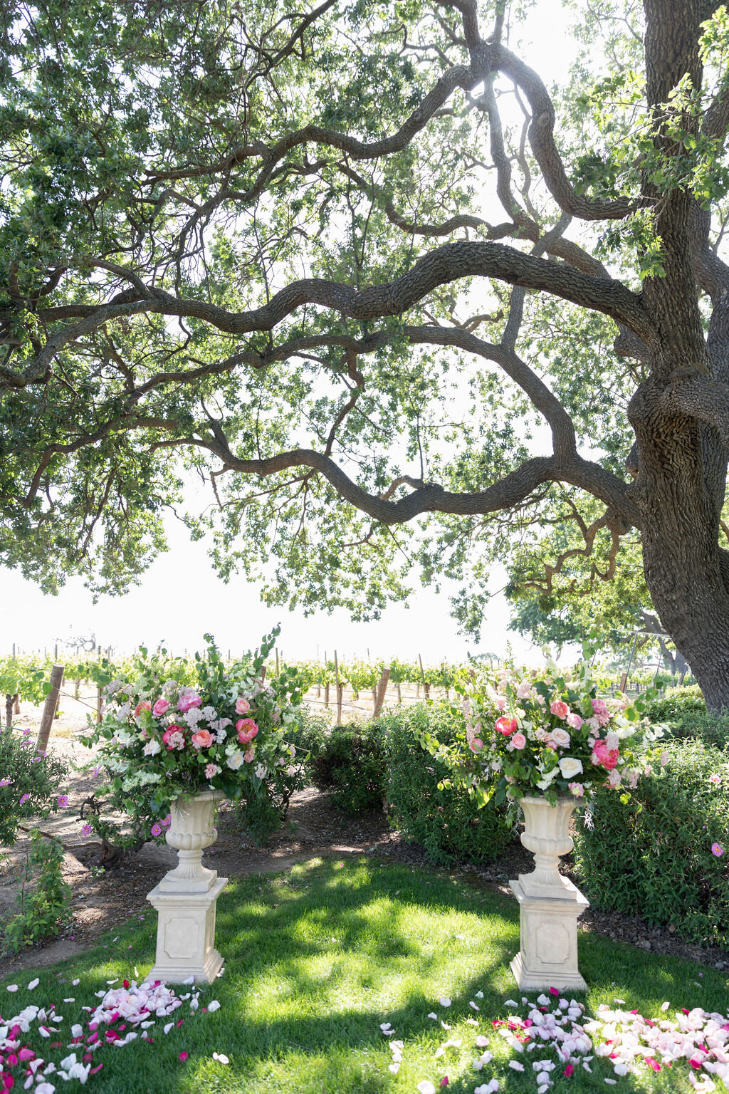 Gainey Vineyard Wedding Ceremony with Pink and White Spring Flowers.JPG