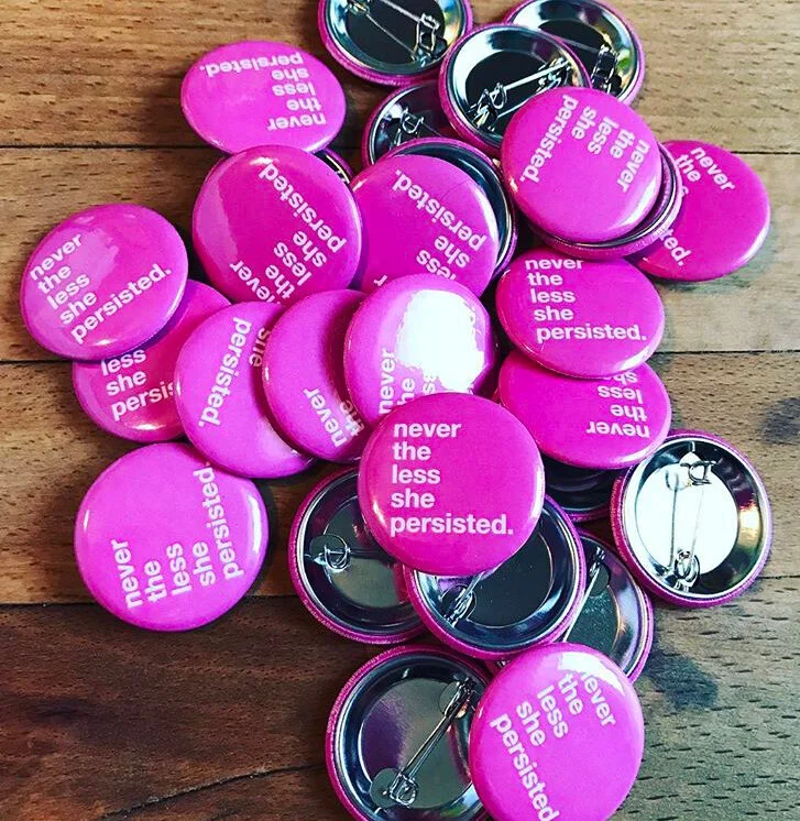 neverthelessshepersistedbutton.jpg