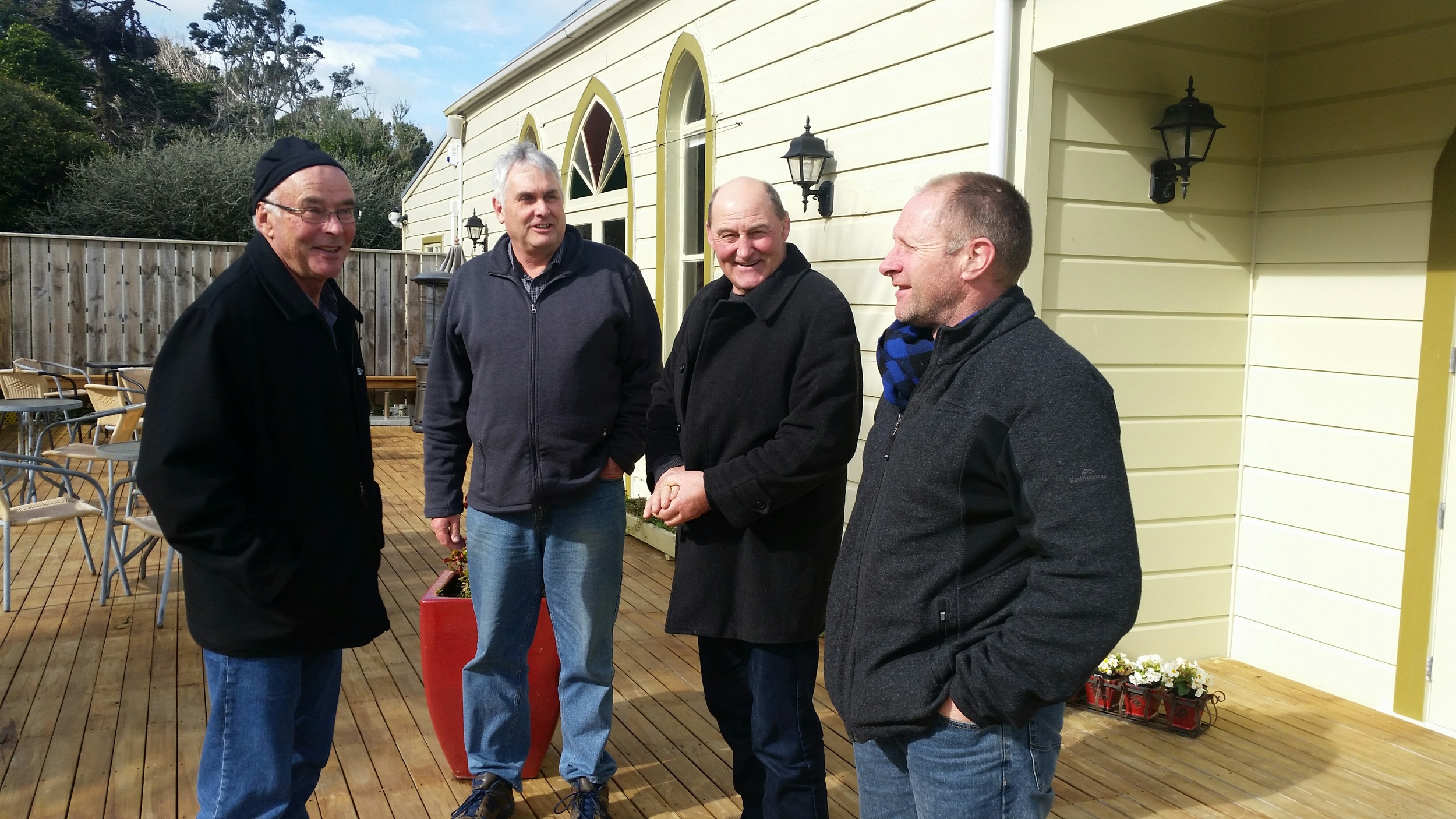 The three agri guides Dave Hopkins, Joe Carey and Peter Henderson with Kelvin Day, ( 2nd from left) at Tairoa Church, part of Tairoa Lodge, the elegant accommodation on the 2nd night of the Agri tour.