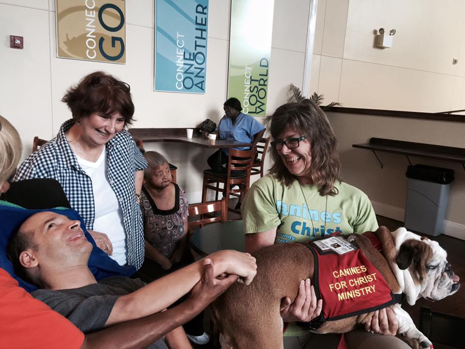 Petting Nia always brings a smile to everyone's face