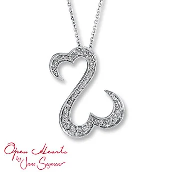 Open Hearts by Jane Seymour® Diamond Necklace The signature open hearts design is decorated in brilliant round diamonds in this breathtaking necklace for her. 1/2 carat total weight. Set in 14K white gold.