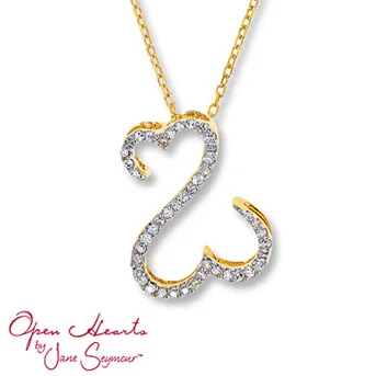 Open Hearts by Jane Seymour® Diamond Necklace Round diamonds dance along the Open Hearts for spectacular sparkle. Set in 14K yellow gold. 1/10 carat total weight.
