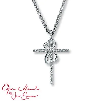 Open Hearts Cross Necklace 1/6 ct tw Diamonds Sterling Silver A diamond-decorated cross dazzles in this elegant necklace for her. Diamond Total Carat Weight may range from .145 - .17 carats.