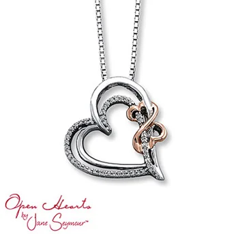 Open Hearts by Jane Seymour® Diamond Necklace Round diamonds and styled in sterling silver. The Open Hearts Design, in 14K pink gold, completes the look. 1/8 carat total weight.