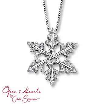 Open Hearts by Jane Seymour® Diamond Snowflake Necklace Sterling silver snowflake is frosted in diamonds for shimmering sparkle. The iconic Open Hearts Design adds warmth. 1/10 carat total weight.