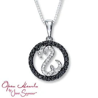 Open Hearts Necklace 1/6 ct tw Diamonds Sterling Silver Black Diamonds are treated to permanently create the intense black color. Diamond Total Carat Weight may range from .145 - .17 carats.