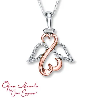Open Heart Necklace 1/20 cttw Diamonds Sterling Silver/10K Gold Suspended from an 18-inch box chain secured with a lobster clasp. Diamond Total Carat Weight may range from .04 - .06 carats.