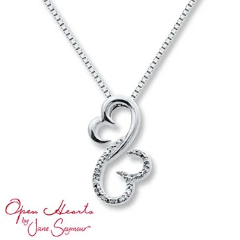 Open Hearts Family 1/20 ct tw Diamonds Sterling Silver Necklace This pretty diamond necklace is fashioned with 1/20 carat total weight of round diamonds in a setting of sterling silver.