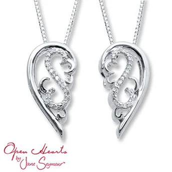Open Hearts Necklace Set 1/10 ct tw Diamonds Sterling Silver This heavenly necklace features two angel wings that come apart - one is for you, one is for someone you hold dear.