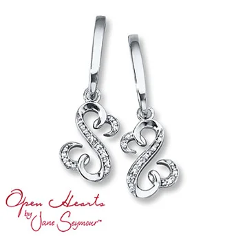 Open Heart Earrings 1/20 ct tw Diamonds Sterling Silver The iconic Open Hearts design sparkles with round diamonds as it dangles from a sterling silver setting in each of these stylish earrings for her. The earrings, from the Open Hearts by Jane Seymour® collection, have a total diamond weight of 1/20 carat and are secured with friction backs. Diamond Total Carat Weight may range from .04 - .06 carats.