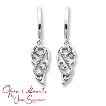 Open Hearts Earrings 1/20 ct tw Diamonds Sterling Silver Sterling silver angel wings frame the diamond-adorned Open Hearts design in these charming dangle earrings for her. The diamond earrings, from the Open Hearts by Jane Seymour® collection, have a total weight of 1/20 carat and are secured with friction backs. Diamond Total Carat Weight may range from .04 - .06 carats.