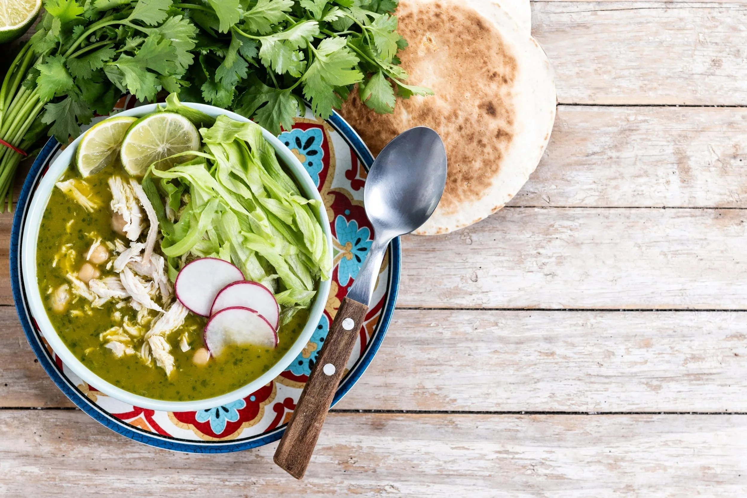 traditional-mexican-green-pozole-soup-on-wooden-ta-2025-04-29-02-33-23-utc.jpg