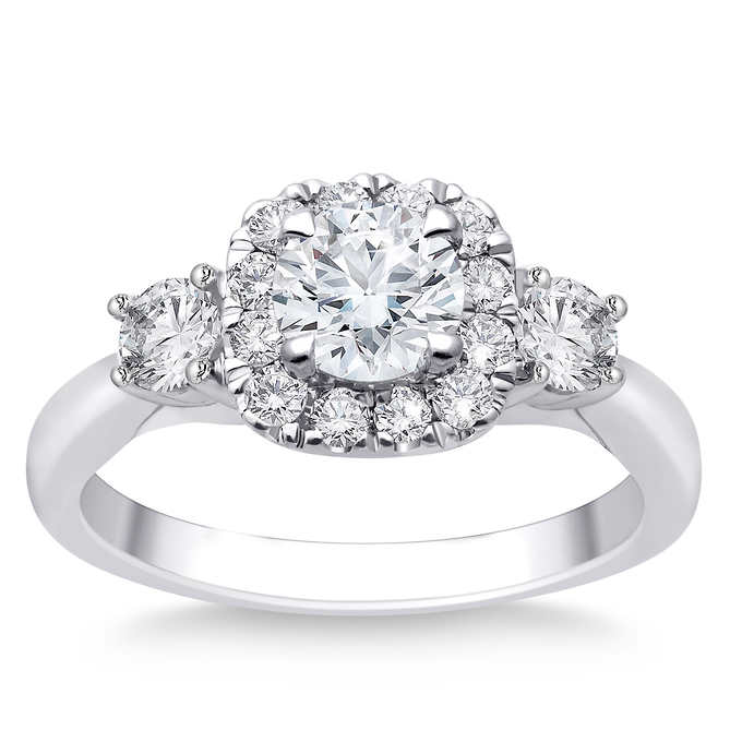 Round Brilliant 1.30 ctw VS2 Clarity, I Color Diamond Platinum Three Stone Ring.jpeg