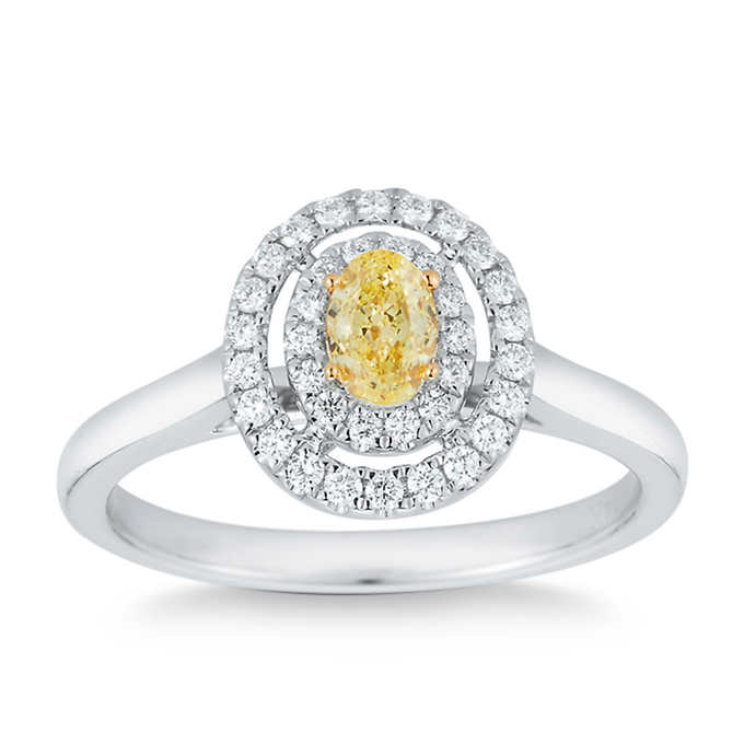 Oval Cut 0.30 ct VS2 Clarity, Fancy Yellow Diamond 14kt White Gold 0.50 ctw Ring.jpeg