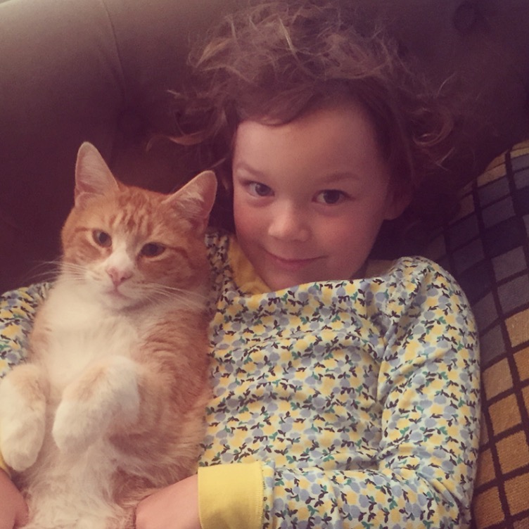 Galilee + Sampson = LOVE. This cat let's her dress him up and put doll clothes on him...and pretty much just sits there. 