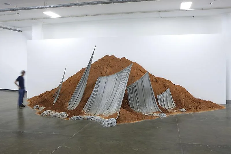 Half Buried Monument