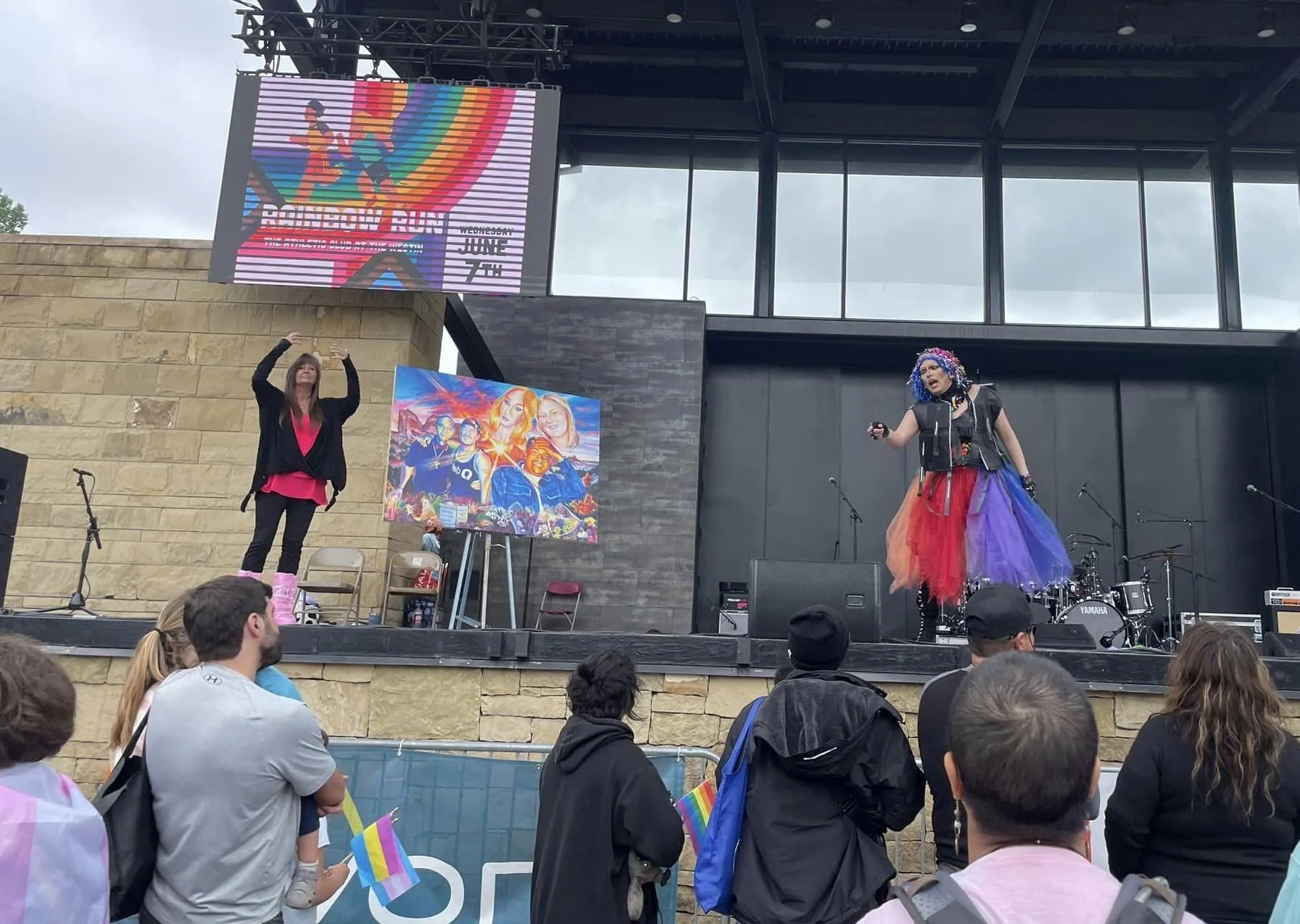 Diamond Starr revealing the painting. 