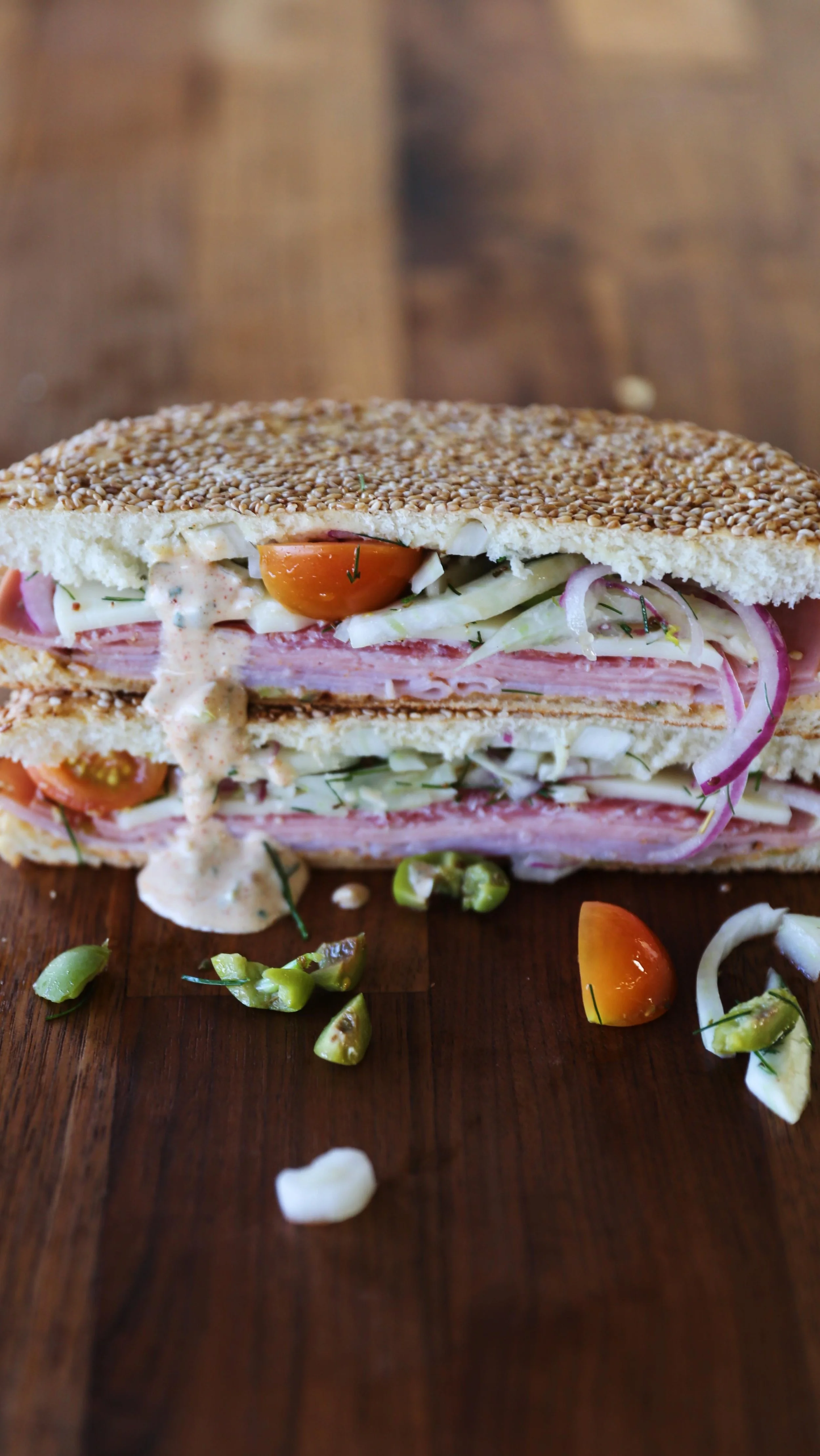 What might possibly be most of our teams favorite, this weeks WORTH TAKEAWAY WEEKLY FEATURE is The Muffaletta! Slices of mortadella, Genoa salami, and smoked ham, pressed on a seeded round with olive and fennel salad, spicy remoulade sauce, and provo