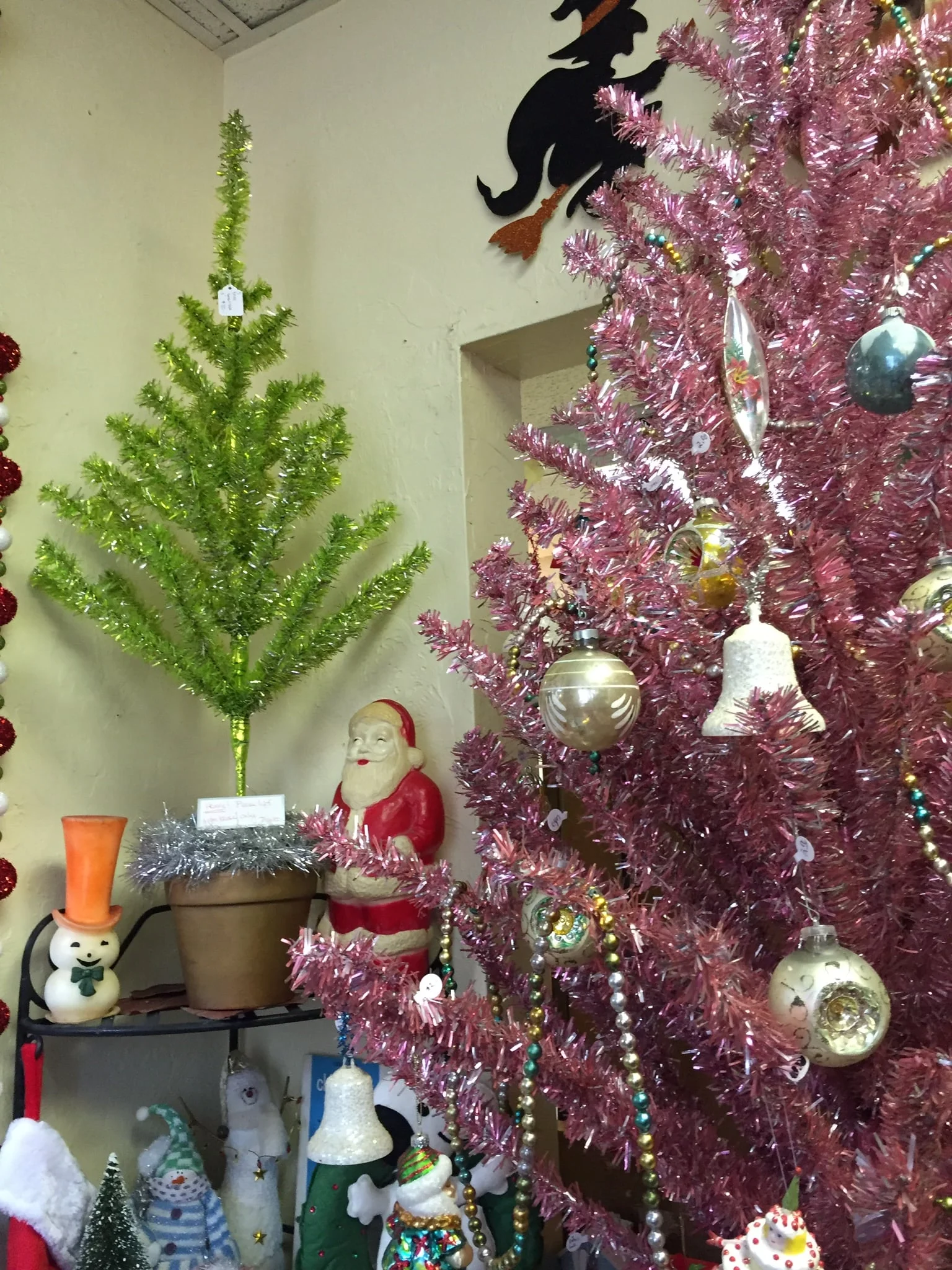 Speaking of symbols, I was reminded of the need for a funky/vintage Christmas tree when I found one. Of course, the more South I go, the more I find things like this. So, if one is still needed for perhaps next Christmas, just let me know. What color tree speaks to you?