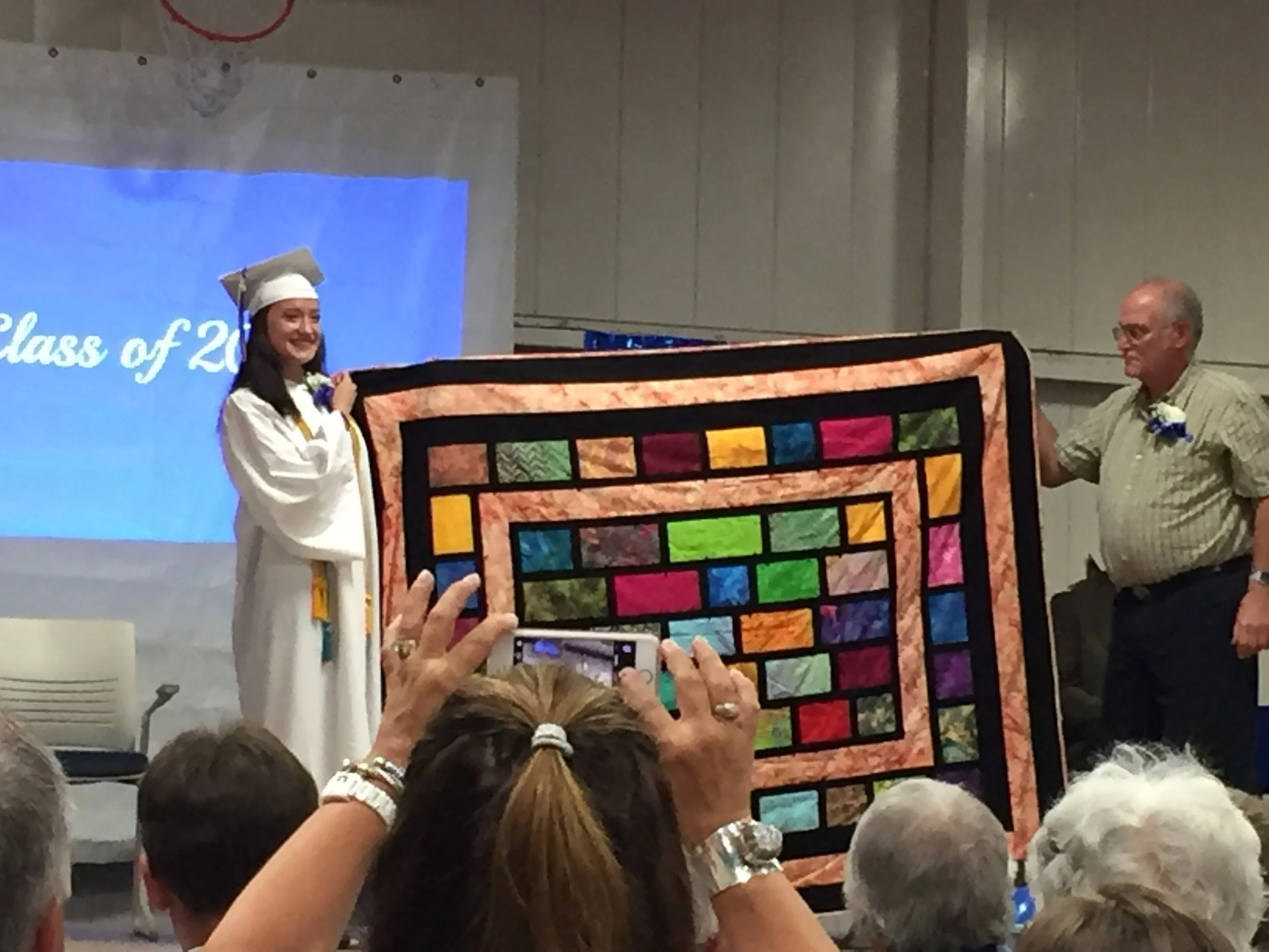 Elena and her quilt Linda Henkel designed this quilt for Elena with a bit of "edginess" to fit Elena's personality and style.