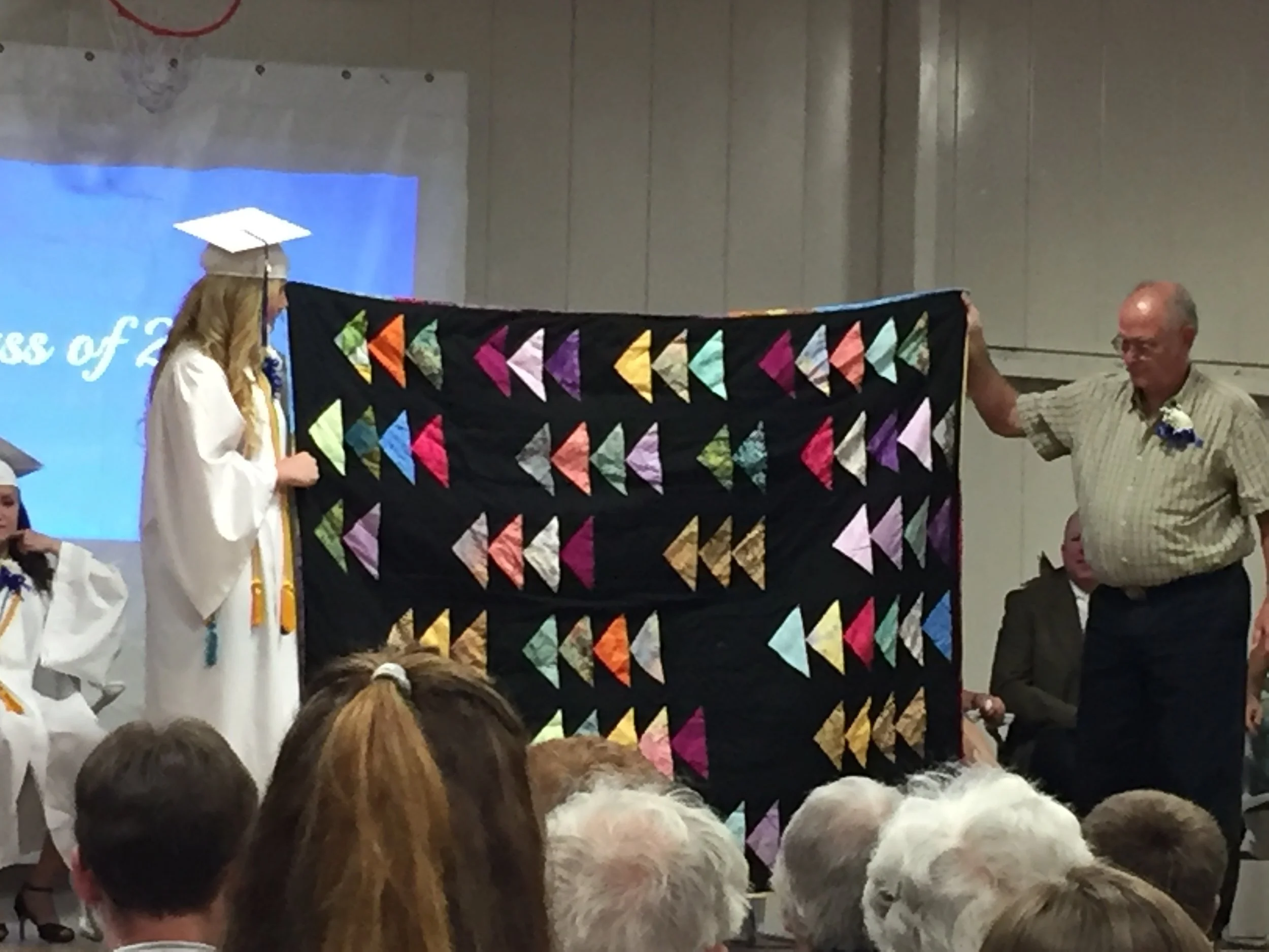 Hailey Jorgenson with her "Flying Geese" quilt.
