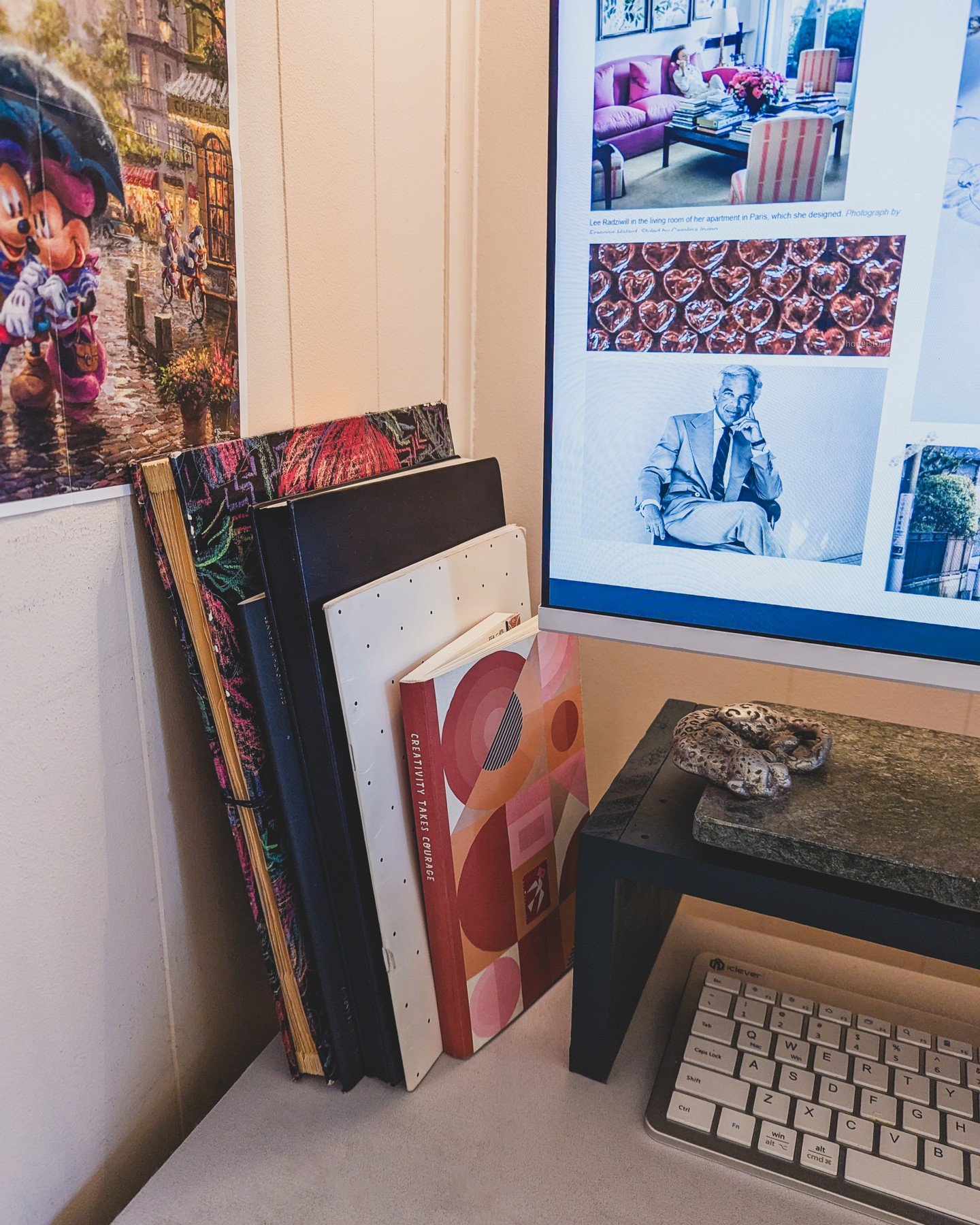 DESKTOP | It's very low-tech over here. Puzzle poster on the wall and Ralph Lauren keeping me company as I work at my desk.