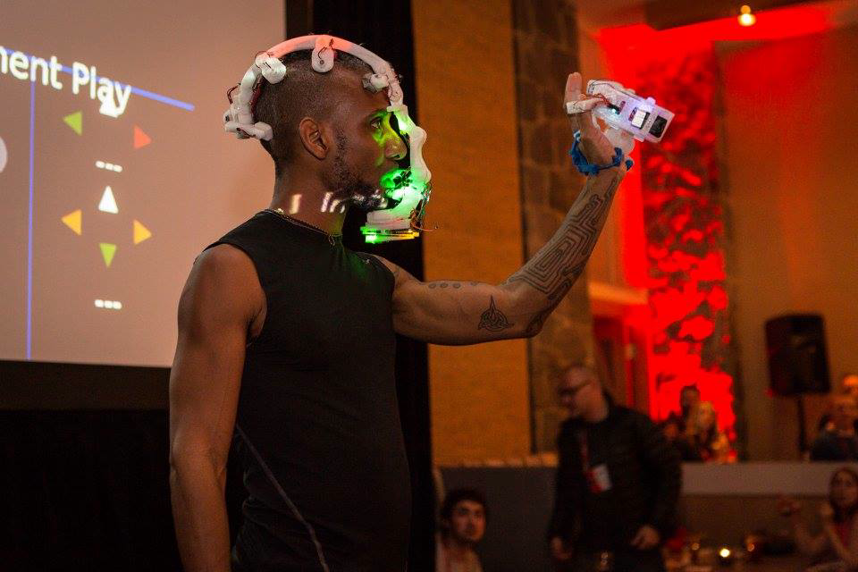 Onyx Ashanti is a sonic-cyborg whose sonomorphological voice is a language called beatjazz. Beatjazz speaks the language of brainwave modulation to ultimately directly program his own mind multidimensionally through his music.