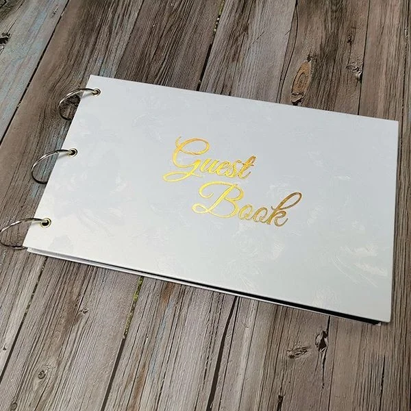 small_white_rose_patterned_guest_book_2_600.jpg
