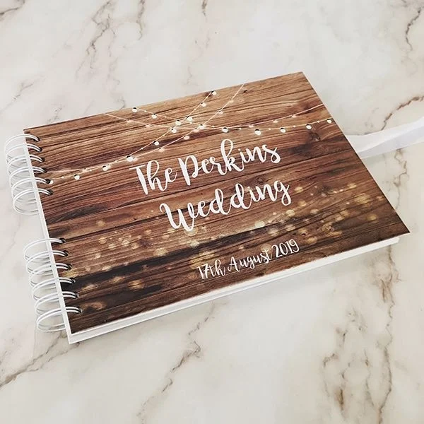 rustic_wood_with_hanging_fairy_lights_guestbook_600.jpg