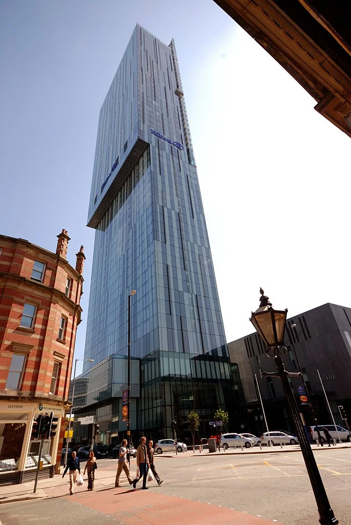 Hilton Manchester Deansgate hotel wedding and event venue with modern glass architecture and skyline views.