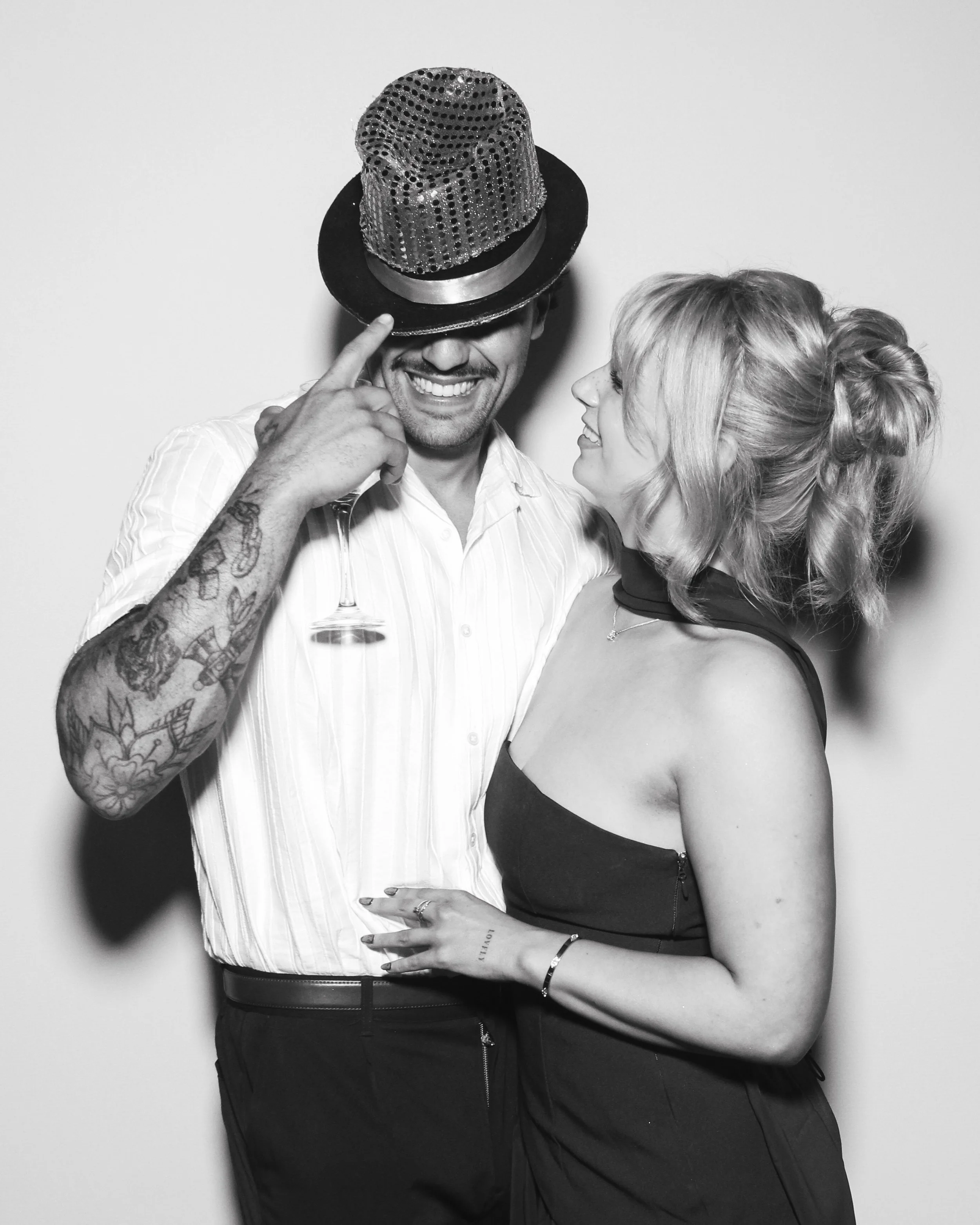 Wedding guests enjoying the ICON Photo Booth at Hazel Gap Barn, one of Nottinghamshire's most popular wedding venues.