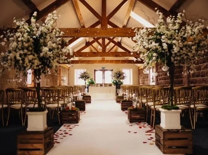 Heaton House Farm wedding venue near Manchester with rustic farmhouse styling and wooded grounds