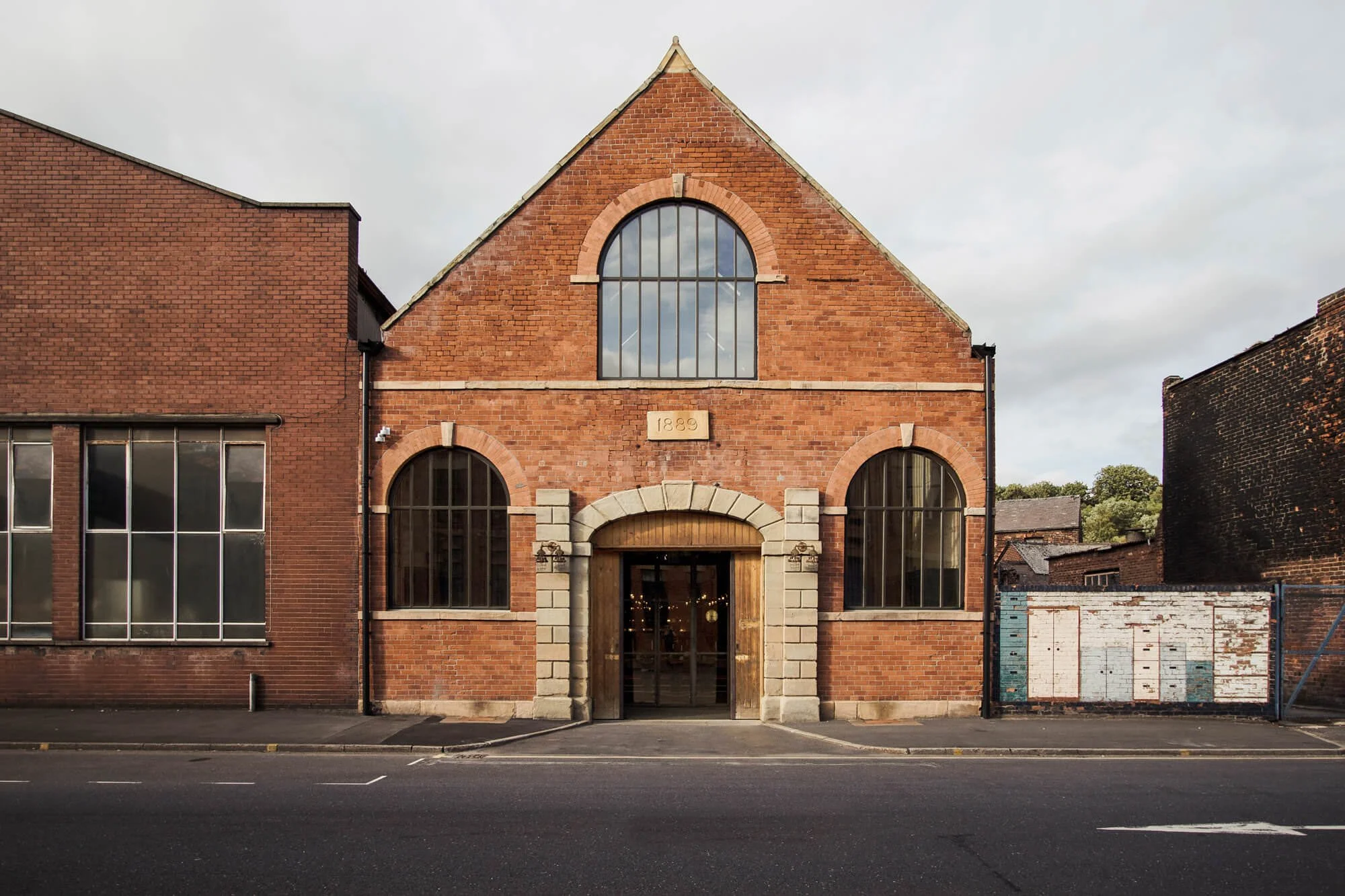 The Mowbray wedding and events venue in Sheffield with its red-brick exterior and arched windows.