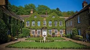 Whitley Hall wedding venue in Sheffield with stone exterior and landscaped gardens