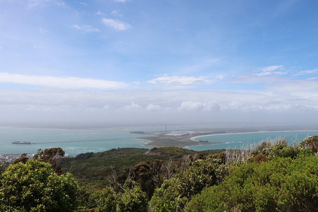 Stewart Island is somewhere under those clouds