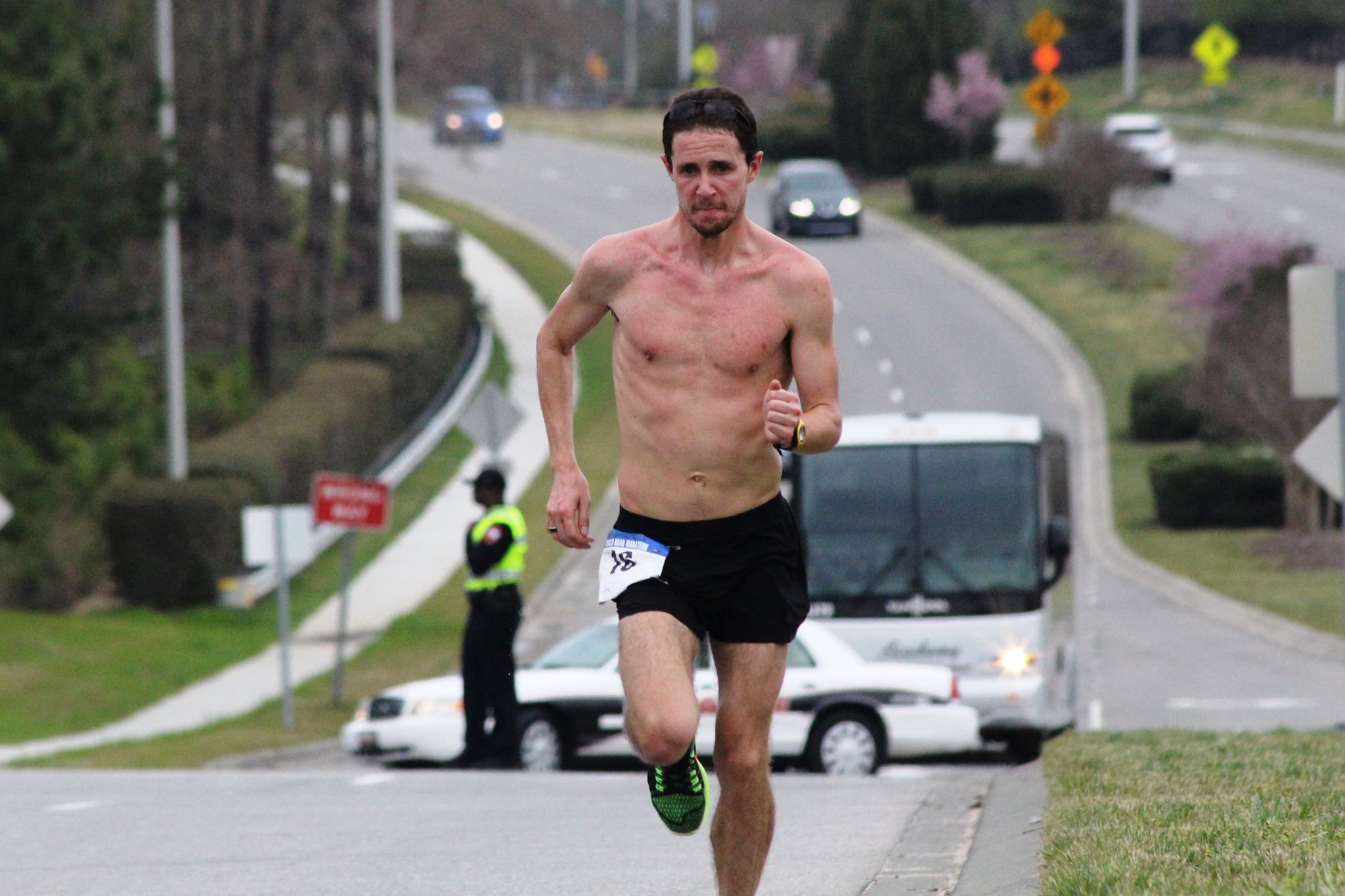 Peyton digging deep at Mile 25. Photo Credit: Tim Meigs