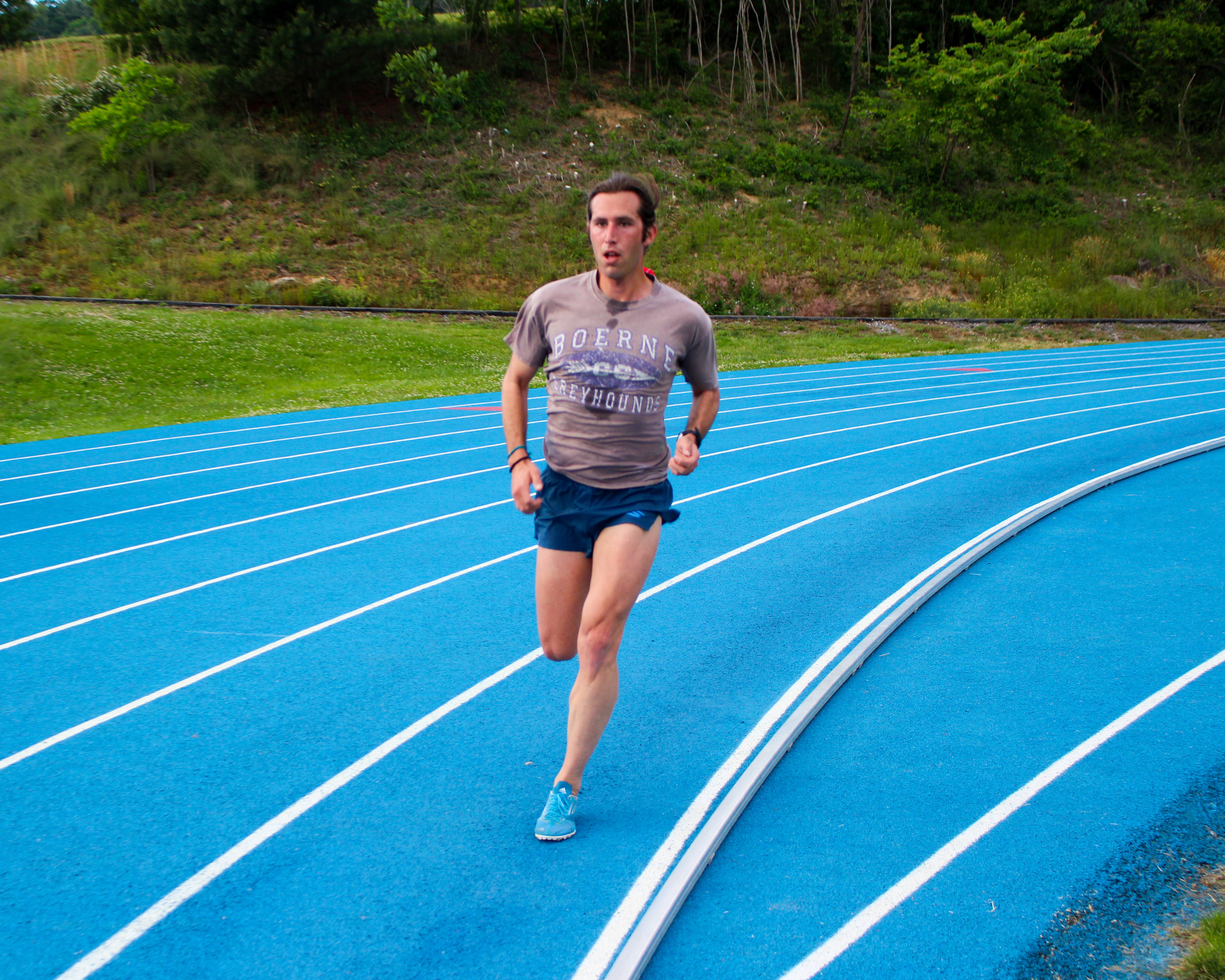 Chass Armstrong rounding the track in one of his recent marathon tune-up workouts.