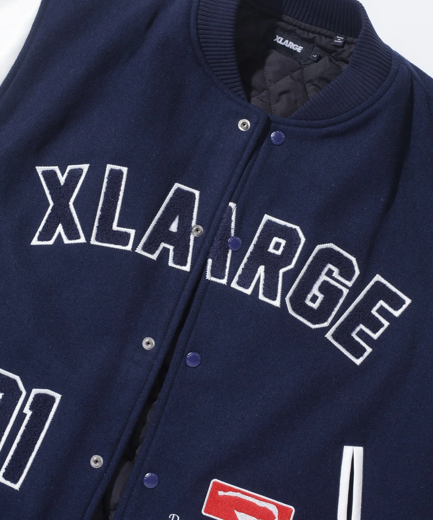 ONE·JAM·TART· STORE XLARGE® JAPAN OG LOGO VARSITY JACKET | NAVY