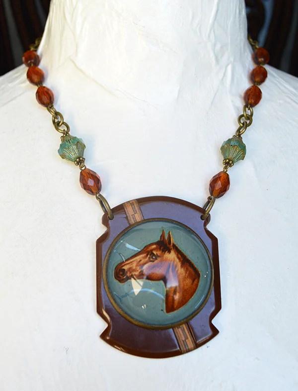adorn by samouce_antique brass horse rosette Bakelite buckle necklace.jpg