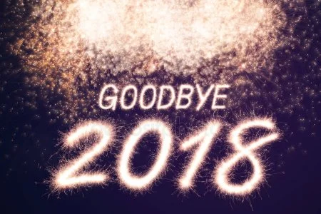 depositphotos_210913490-stock-photo-goodbye-2018-written-sparkle-firework.jpg