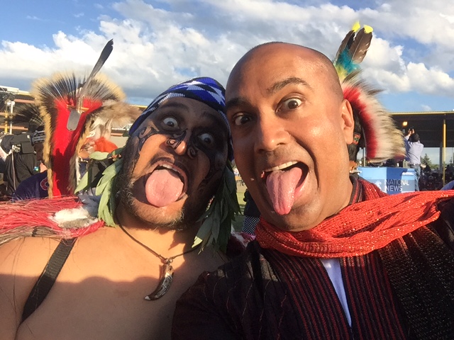 Whetu Rangihaeta from New Zealand shows me the Maori way of saying hello!
