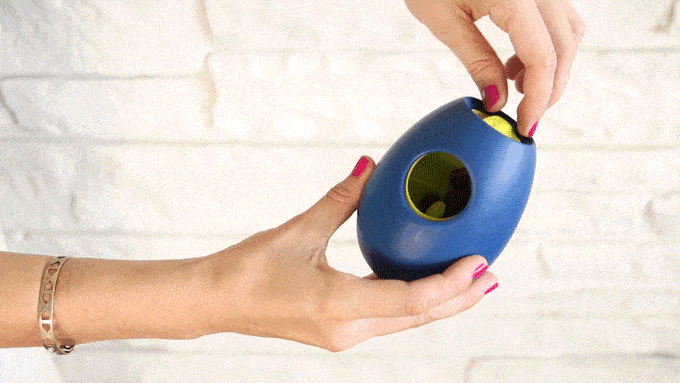Twisting the Tikr timer reveals different sized holes for different sized treats.