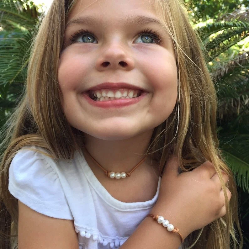 Little Girls Three Pearl Necklace and 