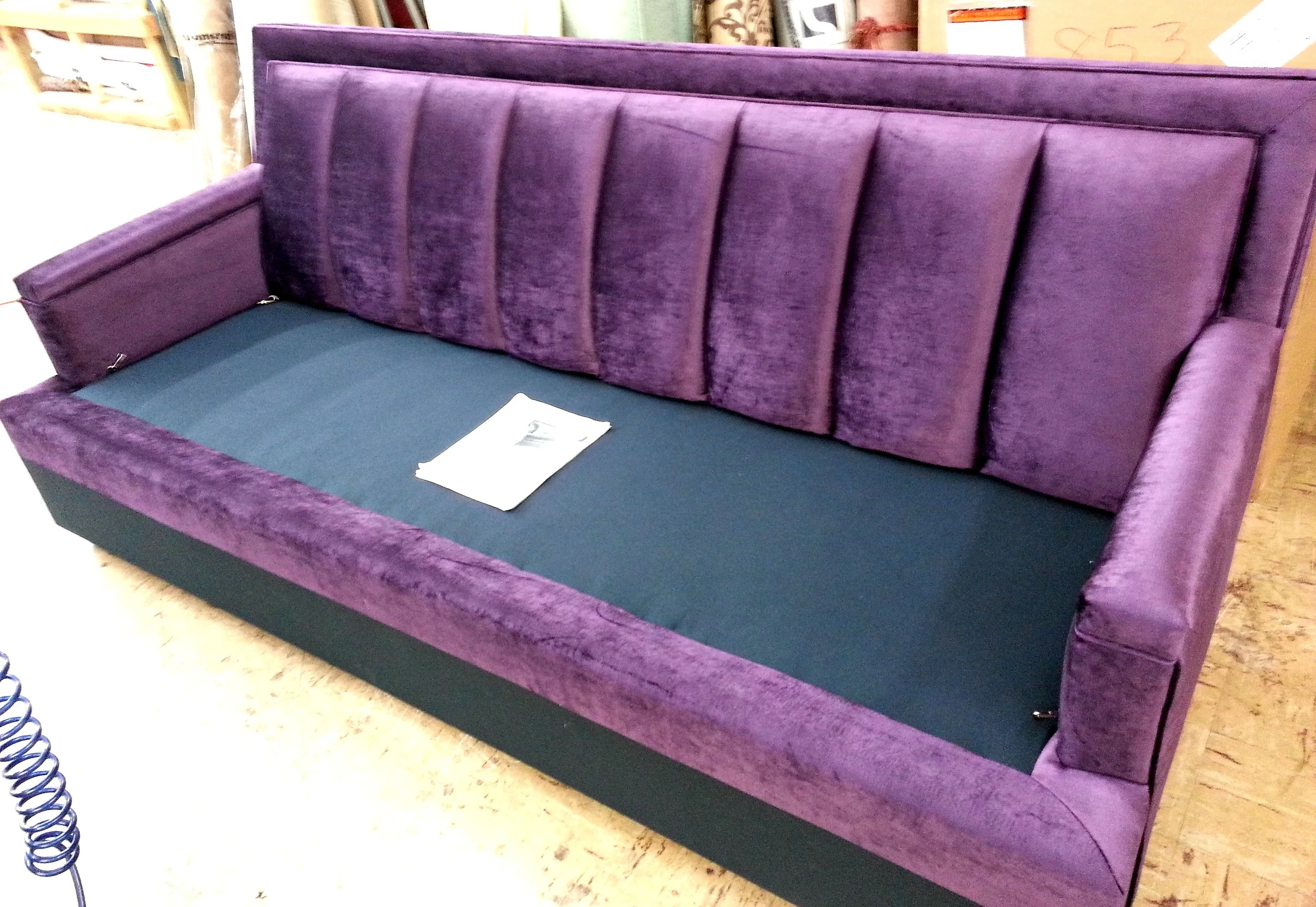 purple velvet sofa with large channel back