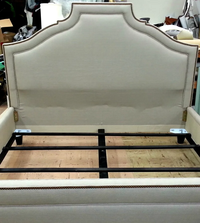 King size bed with decorative french natural colored nails