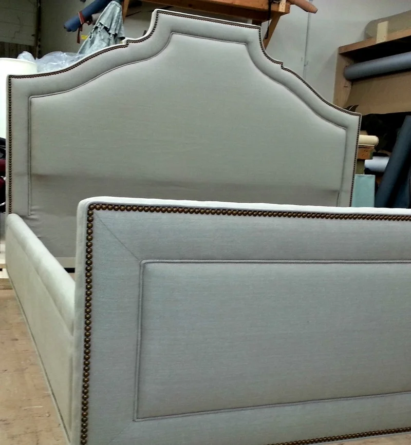 King size bed with decorative french natural colored nails