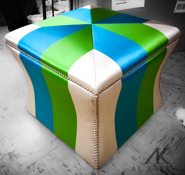 Curved side custom ottoman with nickel finish