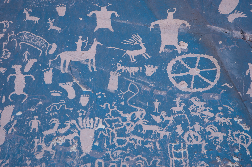 Newspaper Rock art is likely from several periods. The rock is listed on the National Register of Historic Places.