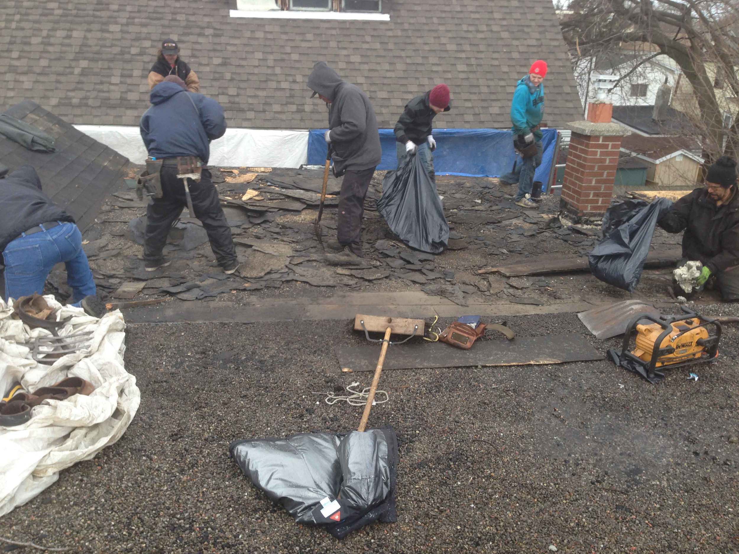 Old roofing being removed